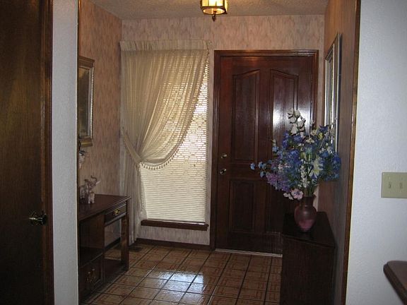 Tiled Entry with Coat Closet