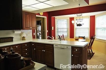 Kitchen w/bay
						:
						Eat-in, Amish cherry cabinets,ceramic tile floor,appliances stay,laundry center.