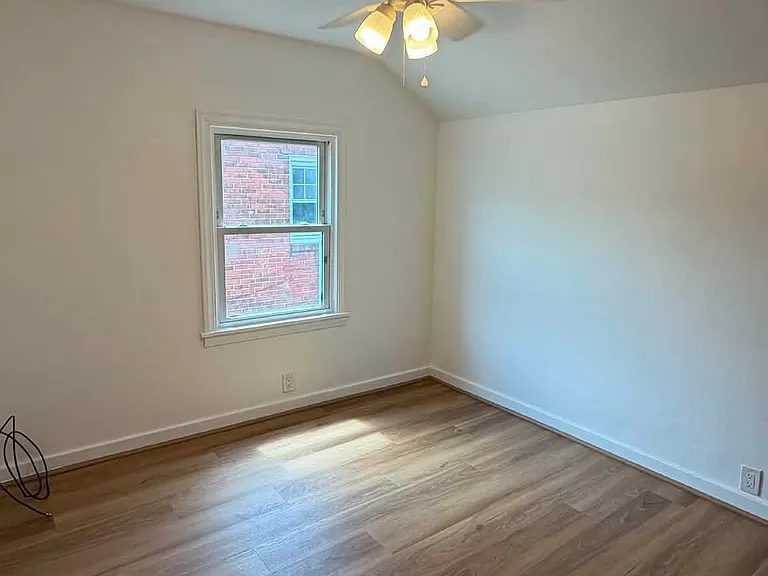 Second bedroom -new flooring, paint and ceiling fan