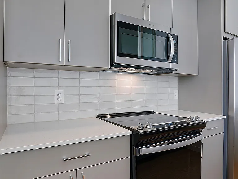 Clean finishes and an open layout define the kitchen.