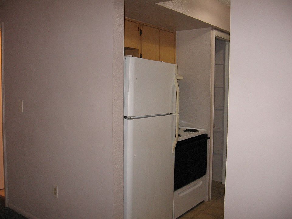 Kitchen Refrigerator, range, and closet pantry. Area: 8 ft W x 8 ft L.