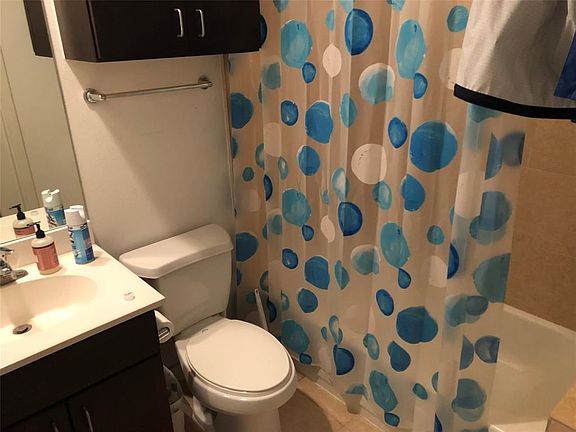 Downstairs bathroom adjacent to the downstairs bedroom