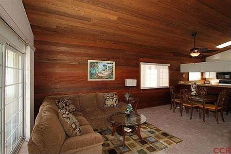 Entry to spacious and open living room, dining and kitchen.