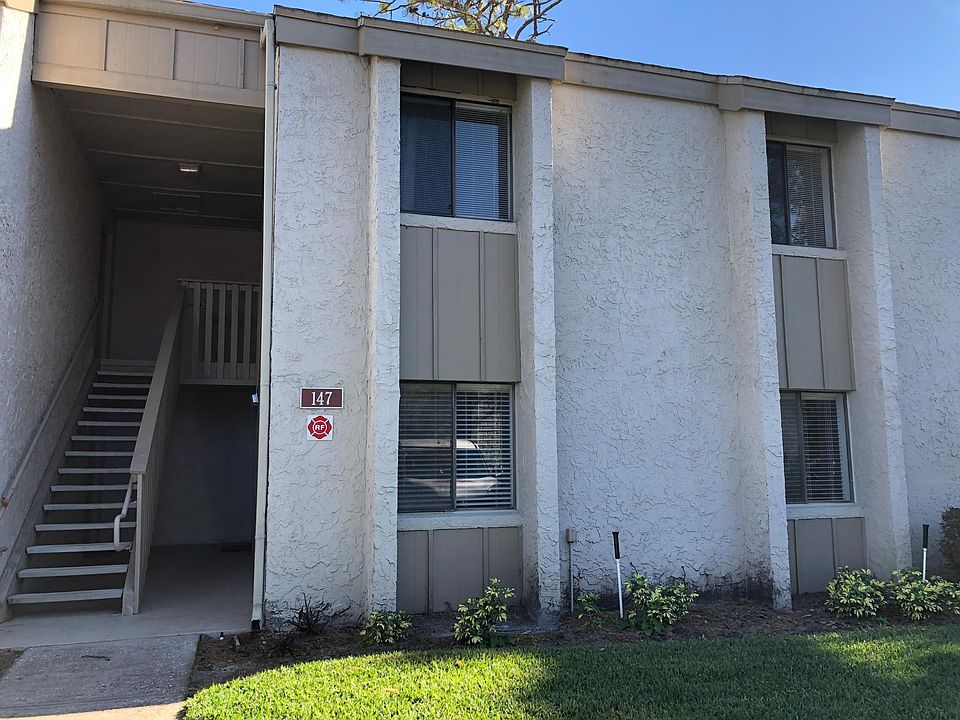 From private parking space right outside lower level unit