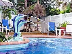 Heated pool with private tiki bar