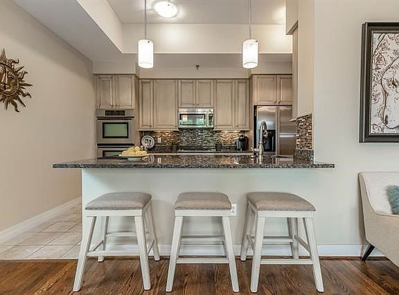 5th image of 4900 Central St APT 203