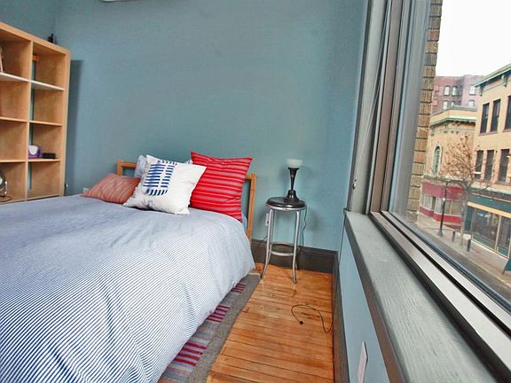 second floor bedroom has a private bath with glass enclosed