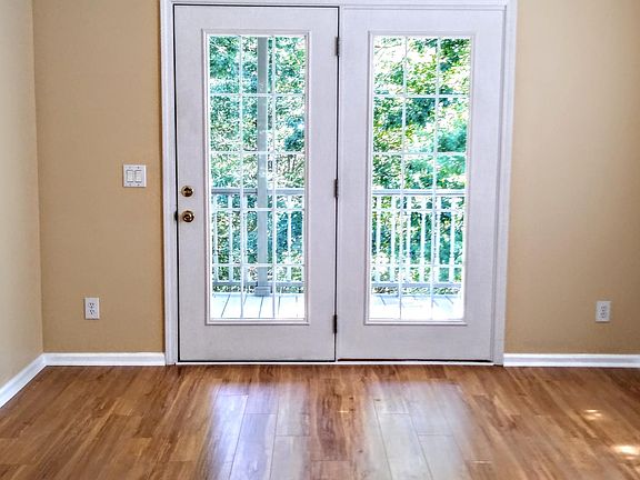 Dining room looking onto deck and woods
