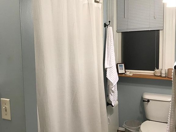 Bathroom (tiled shower and jacuzzi tub)