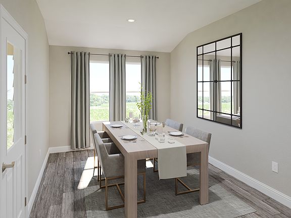 Enjoy a nice dinner around the dining table.
