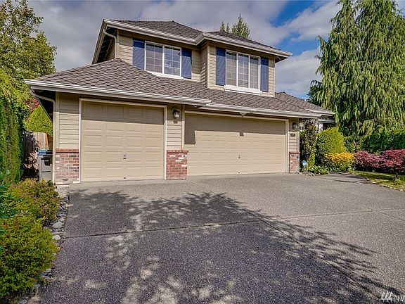 Huge 3-car garage with extra storage space attached.