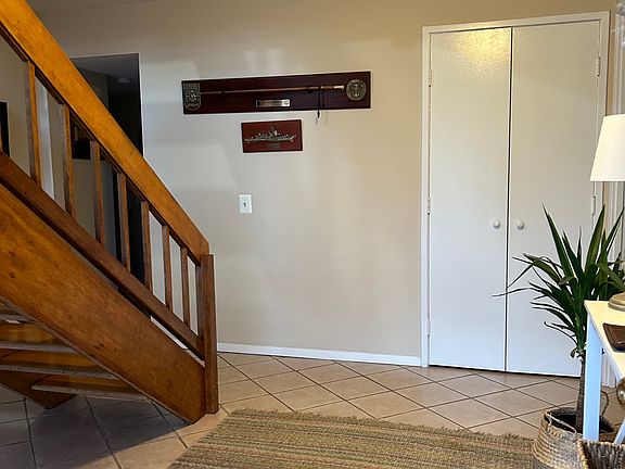 Spacious (12' x13'), bright and inviting Foyer with ceramic tiles and guest closet.