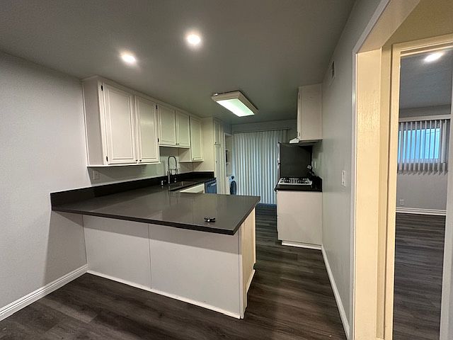 Add a chair in then you have a granite dinning table.