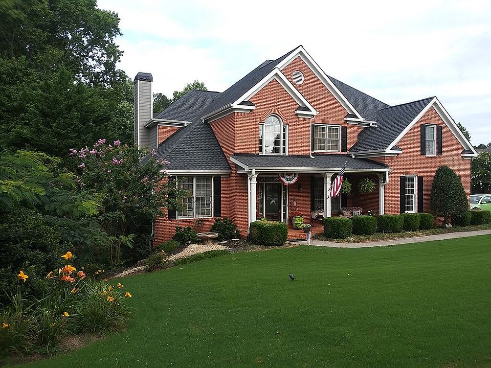 crnr lot, sitting frt porch