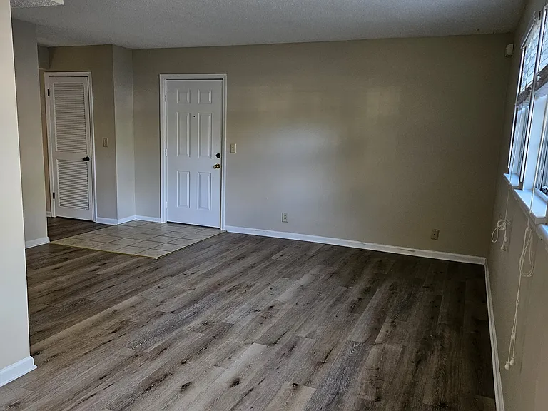 Living/dining area. Ground floor apartments have snap flooring.