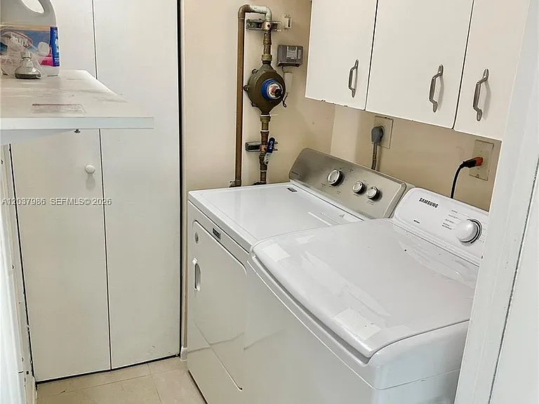 8955 Wiles Rd #208 — Photo 13