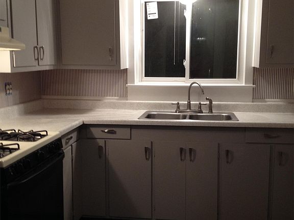 Kitchen with lots of cupboard space, as well as a pantry