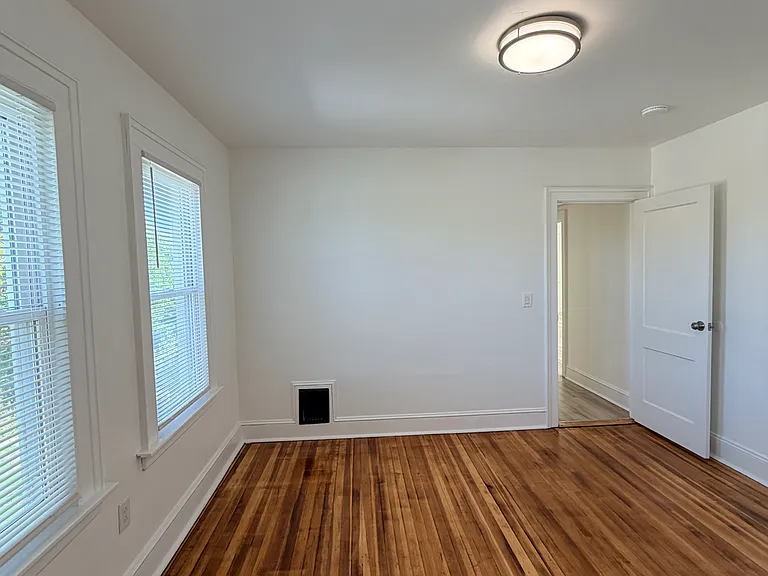 Third bedroom left of bathroom