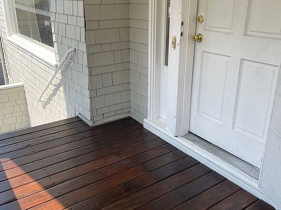 Private porch and entryway into unit.
