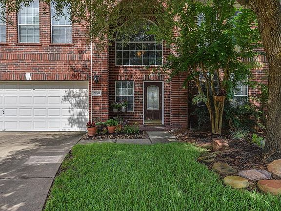 Beautiful big windows across the front of the home. Great front covered porch.