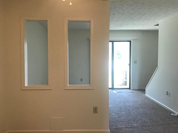 Looking from the kitchen to the patio door.