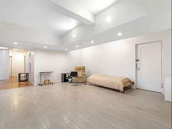 Spacious and bright living room with new floors