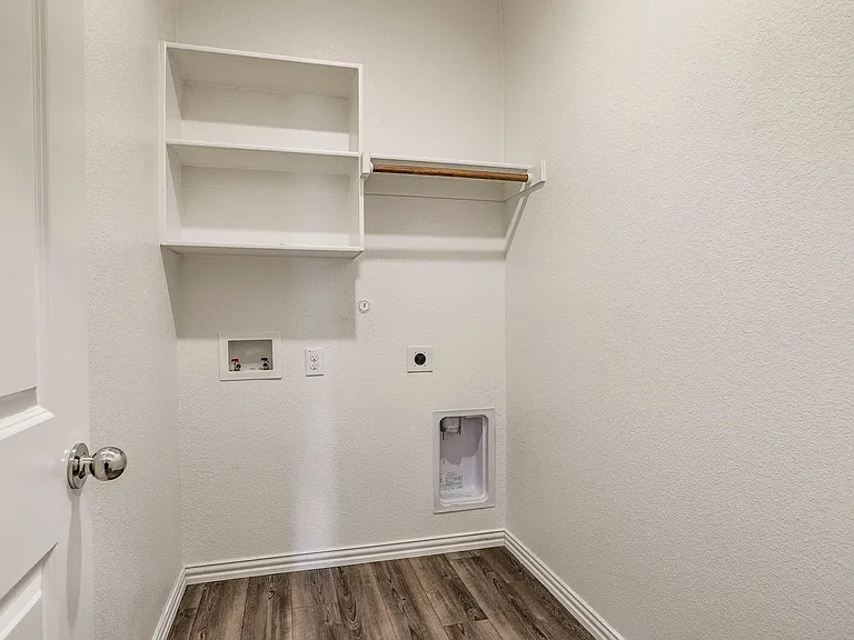 Laundry area with dark hardwood / wood-style floors, washer hookup, hookup for an electric dryer, and hookup for a gas dryer