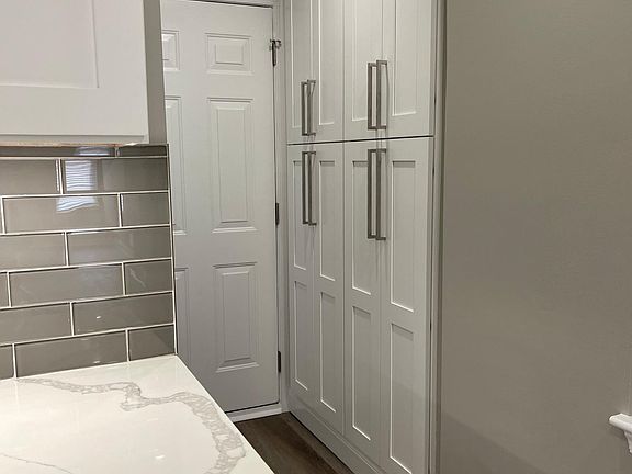 Pantry next to kitchen area