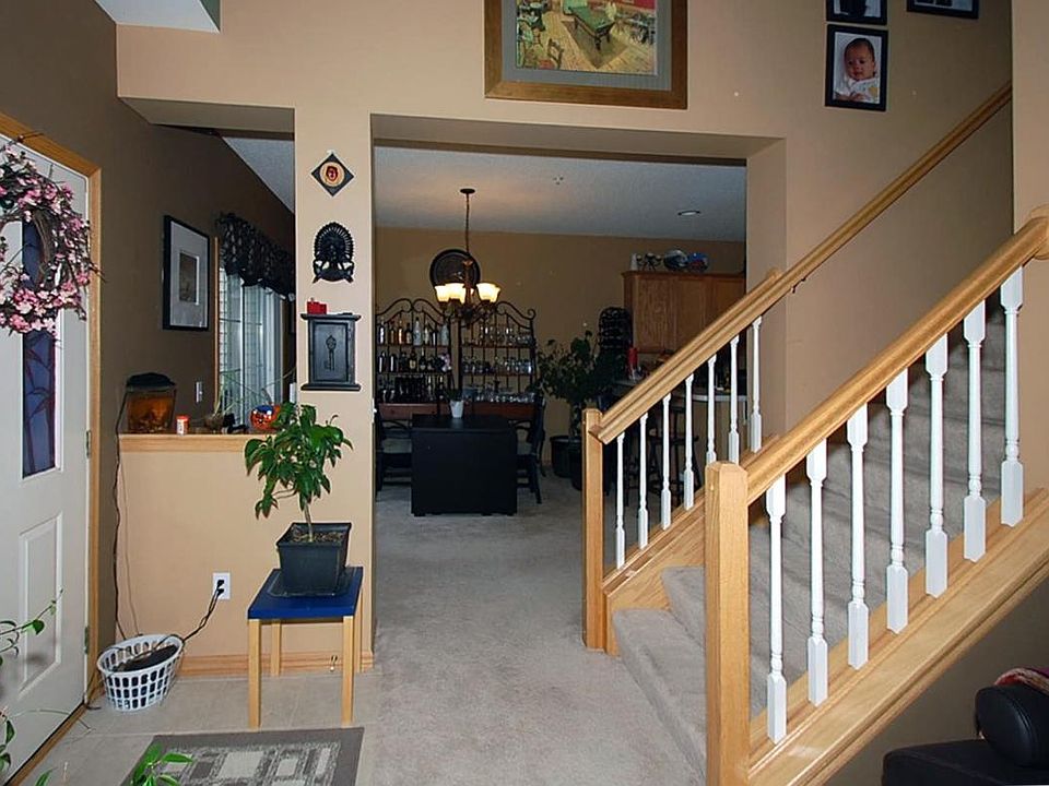 Entrance leading to the second floor. Left side is the dining room. Right side is the livingroom.