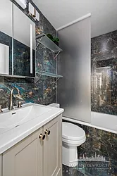 Sold by Manhattan Realty Group