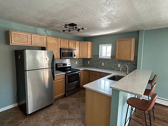 Kitchen. Bar stools can be left for tenant if they want.