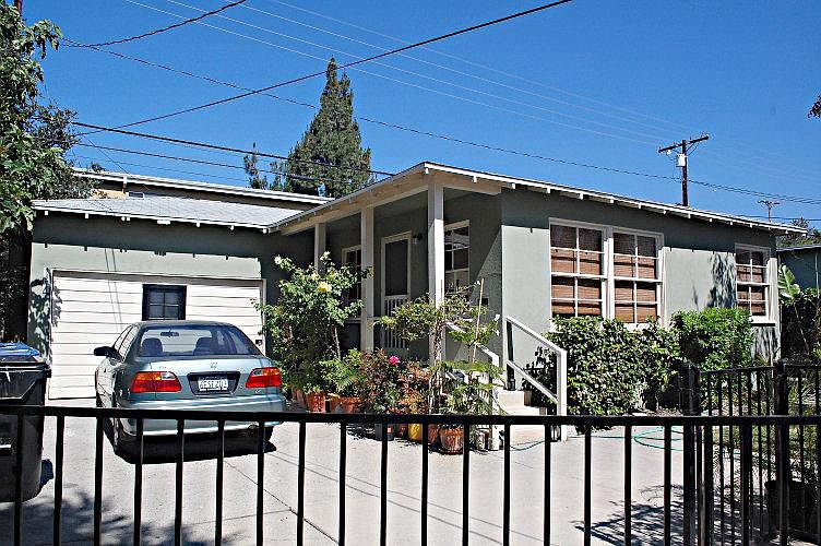 One bedroom house with attached garage.
