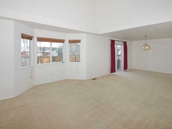 Living Room Opens to Dining