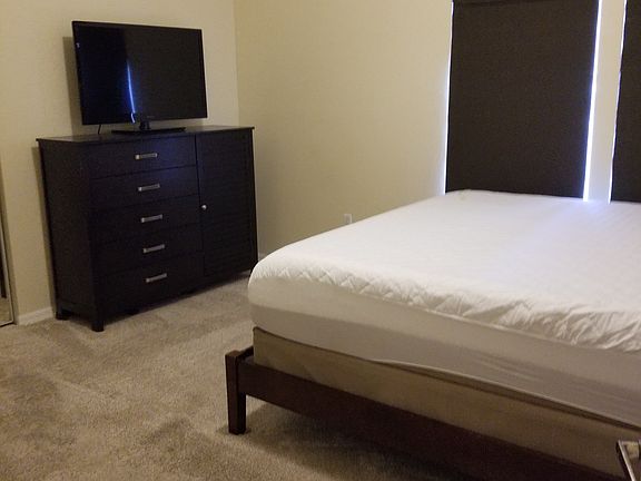 large bedroom with complete set