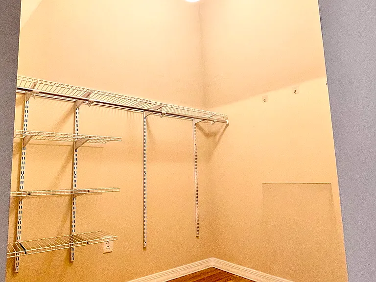 Attic walk-in closet inside turret.