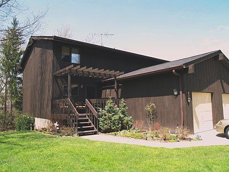 End unit with spacious side yard.