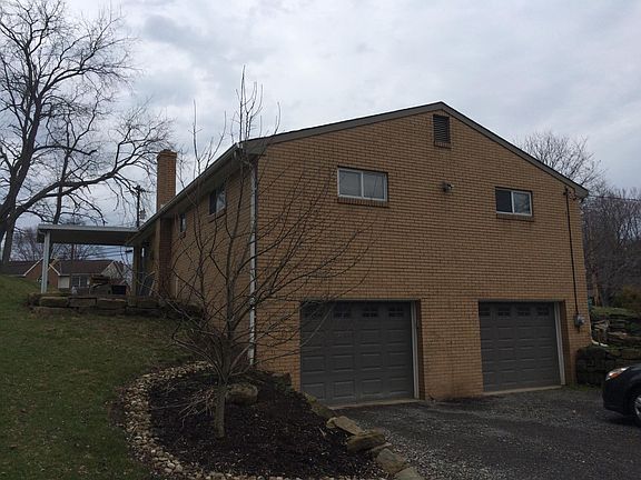 Left exterior of house - 2  car integral garage