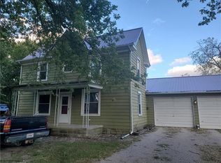 511 N Main St, Corder, MO 64021