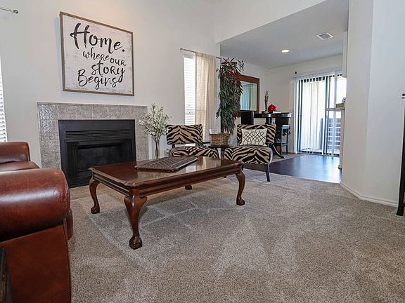 Spacious living room with natural light, open layout, and comfortable design perfect for everyday living in Arlington, TX