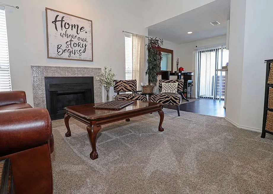 Spacious living room with natural light, open layout, and comfortable design perfect for everyday living in Arlington, TX - Sunset Point