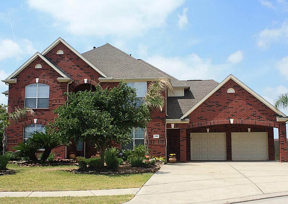 Home features a 3 car tandem garage