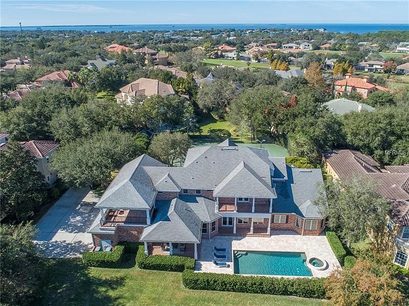 What's your passion?  Golf or Tennis?   A timeless brick estate perfectly positioned on .79 acres, one of the largest lots in th