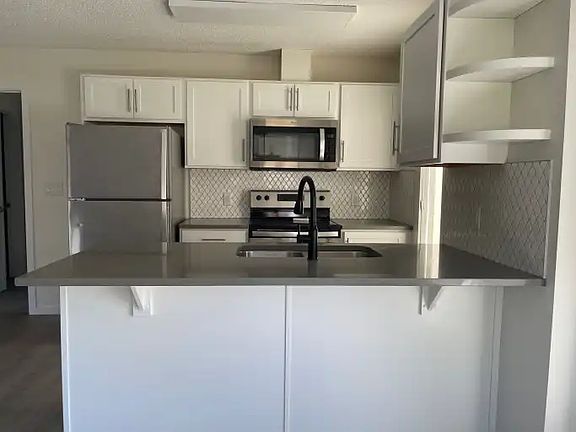 4th image of 394 Windermere Rd NW #1A