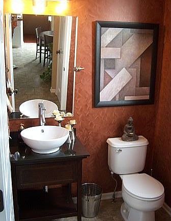 Faux finish and vessel sink in main level powder room