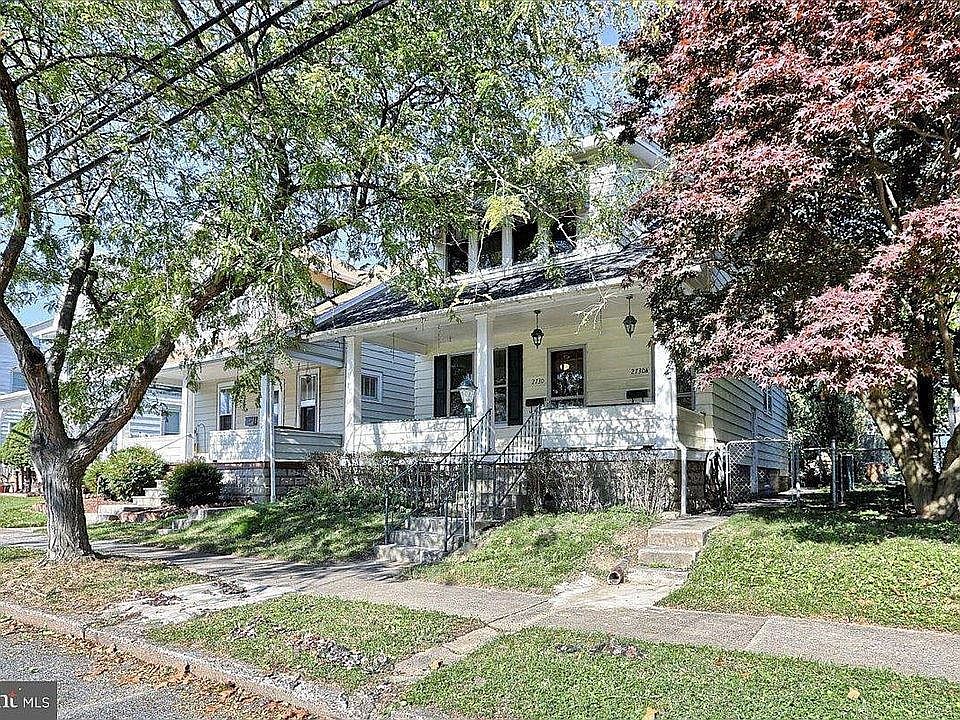 Front Entry and Porch - A lovely place to live and relax...