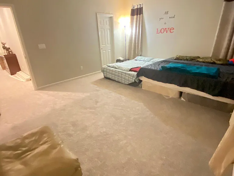 Master Bedroom - One Cal King and One Queen placed together .