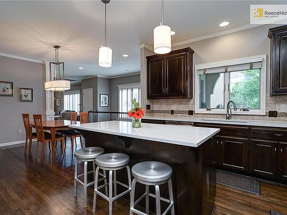 Kitchen opens to dining and then great room.