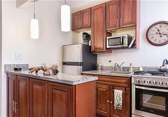 3rd image of 160 E 3rd St APT 5G