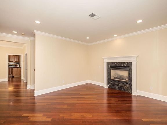 Living room, looking towards formal dinning and kitchen
