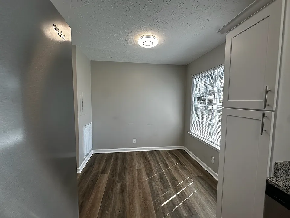 Generous dining area with additional space that's perfect for a desk, home office or homework station.